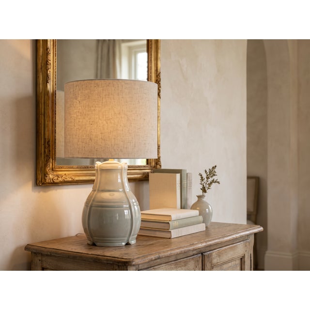 A made-to-order ceramic table lamp by Audrey White McCumber of Red Bear Pottery, this sculptural work brings a...