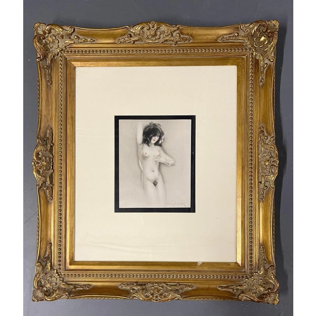 Hand Colored by Louis Icart "Slightly Swollen Areola." An authenticated colored etching by Louis Icart in a fine gilt wood...