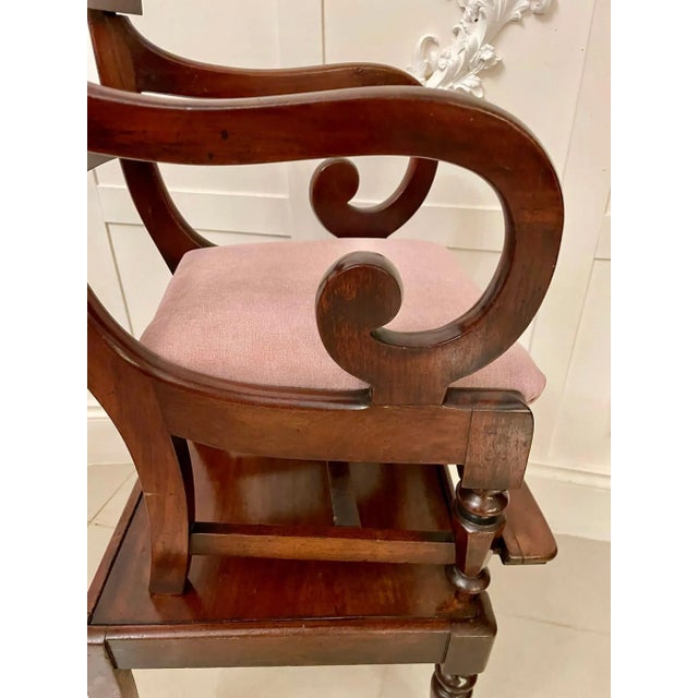Unusual antique william iv quality mahogany child’s armchair and stand having a quality arched shaped top rail and splat...