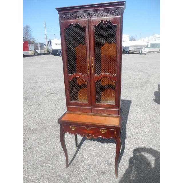 I have a very nice Vintage Baker Furniture French Country Secretary Fold Out Desk. This secretary is in very good vintage...