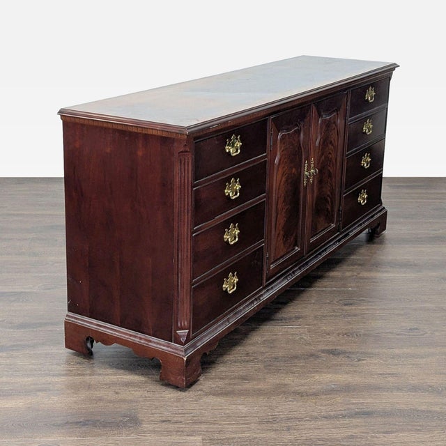 This Thomasville dresser offers plenty of storage with nine drawers and a spacious center cabinet concealing 4 more...
