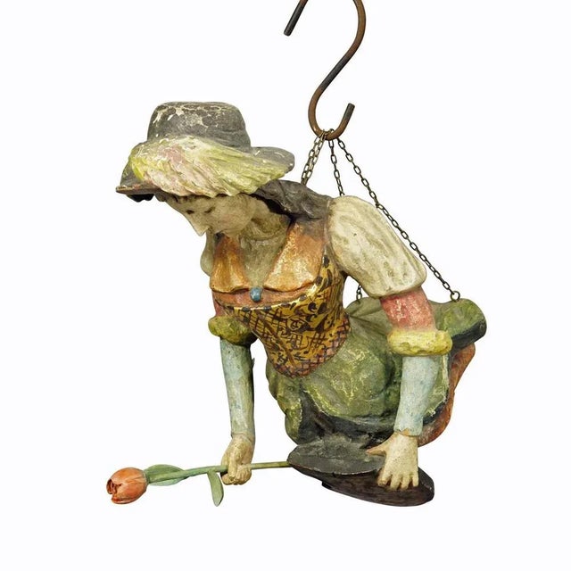 An antique hanging piece of a medieval noble lady holding blazon and rose. The statue is made of handcarved and painted...