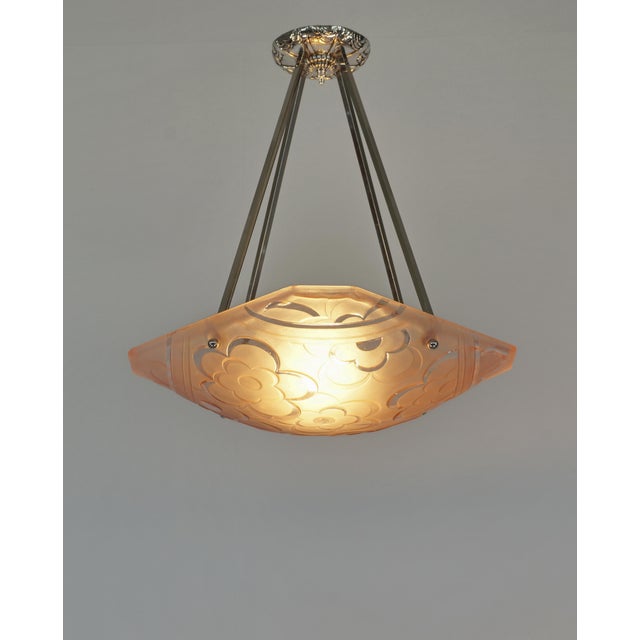 Degué A signed French art deco chandelier around 1930-35 in nickel plated bronze or solid brass. The mounting holds a...