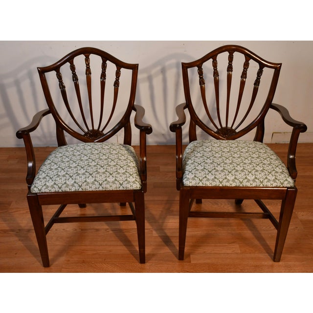 We are Pleased to offer this Beautiful Antique English set of six dining room chairs, from the 1920s. This set includes 4...
