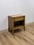 This clean and well-proportioned vintage mid-century modern nightstand with brass pull is a classic and versatile MCM...