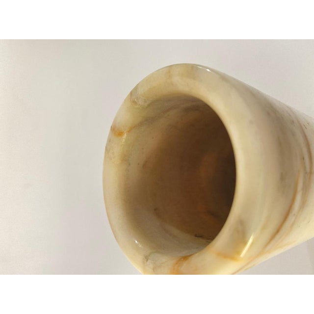 Onyx vase, beige color. This vase has a small size. It has been done in Italy in the 1960s.