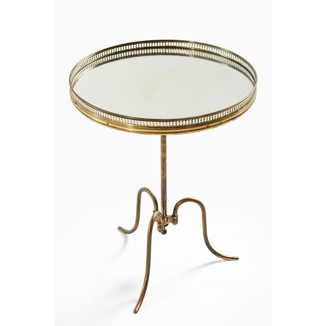 This very rare side or cocktail table, designed collaboratively by Christian Lysberg, Valdemar Hansen, and Julius Therp,...