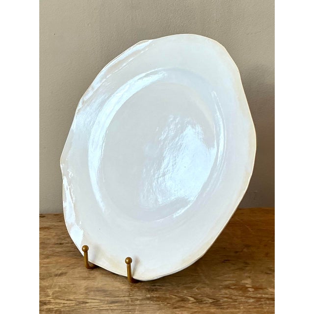 Celebrate the art of the handmade with this exquisite vintage studio pottery salad plate. Expertly crafted using the slab-...