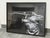 Design Plus Gallery presents an Encore Framed Photograph by Four Hands. This black-and-white photographic artwork captures...