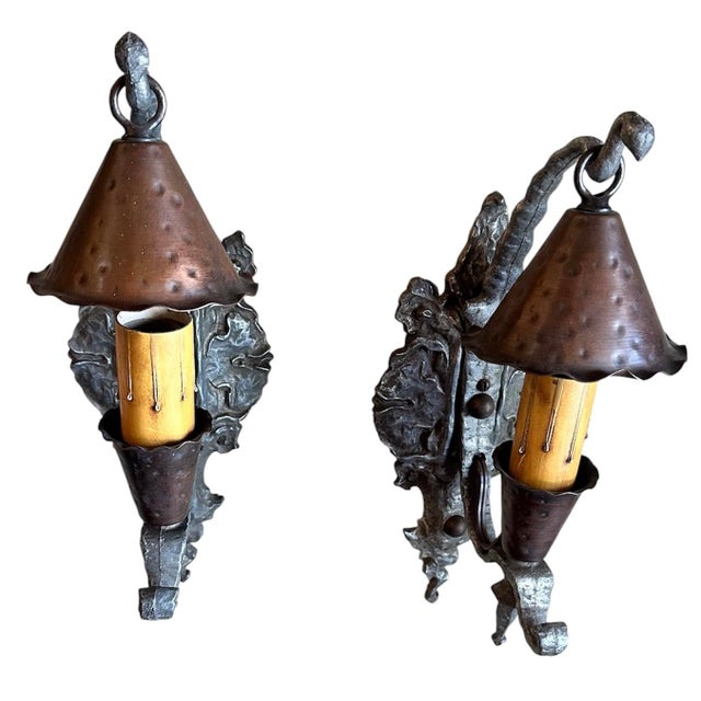 These are really great sconces! Great cast backplates with hammered copper bobesch snd smokebells. Great for your mountain...