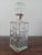 Super cool glass decanter from the 50s-60s era. Each side has star like designs and its top has an octaganol shape....