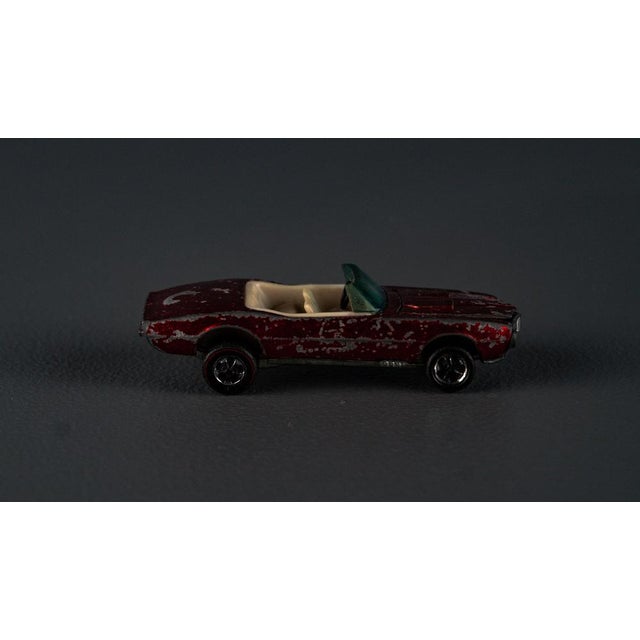 Old Firebird car as a toy. from Hotweehls, around 1960. In original condition, with wear consistent with age and use, a...