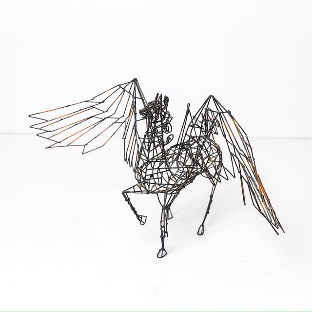 An original hanging wire sculpture attributed to California artist Stan Bennett, an early pioneer of Ferndale's kinetic...