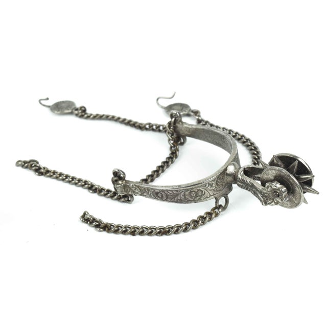 A superb example of Argentine folk art, this pair of Gaucho-style spurs (known as espuelas) celebrates the tradition of...