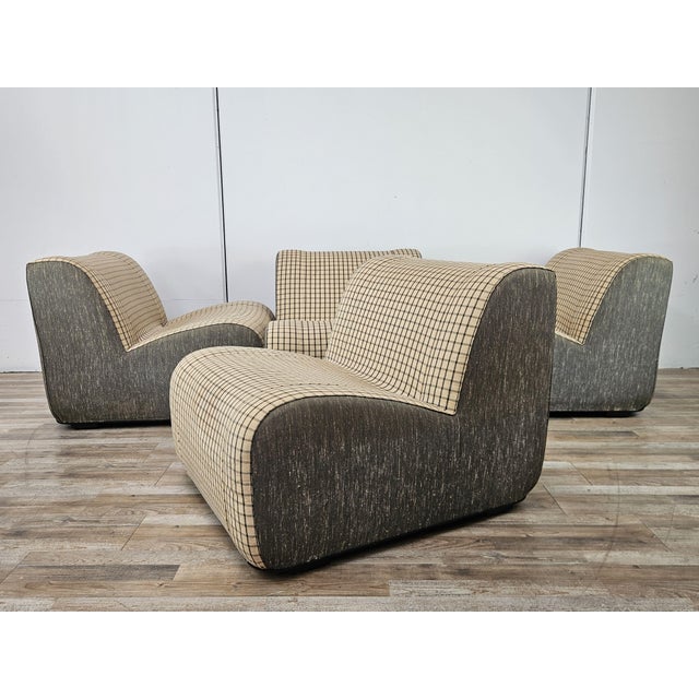 An original vintage modular sofa from the 1970s, composed of four independent elements/armchairs, featuring a soft,...