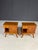 These vintage wooden nightstands feature a clean, understated design characteristic of mid-century modern furniture. The...