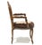 Late 20th century, carved mahogany frames with floral needlepoint upholstery and brass tack trim. 40 x 25.5 x 20 in. Good...
