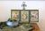 A nicely framed set of vintage postcards, featuring cherubs playing around foil print letters, surrounded by flowers. Each...