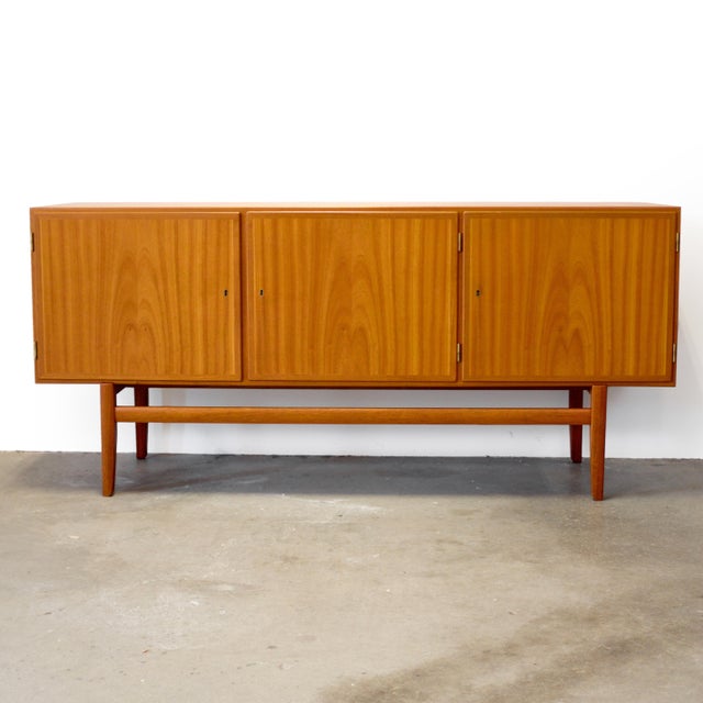 Dimensions: 71” L x 19 1/2” D x 32 1/2” H Origin: Copenhagen, Denmark Designer: Ole Wanscher Manufacturer: Poul Jeppesen...
