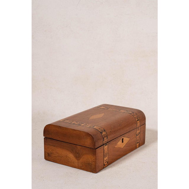 Victorian Tunbridge ware box, circa 1890, featuring a geometric mosaic inlaid lid, fitted interior, and traditional...