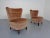 A pair of slightly organic club chairs by Adolf Wrenger for Wrenger from the early 1950s. Original covers and spring core...
