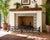 An exceptional antique Italian hand-forged wrought iron fireplace fender, dating from the late 19th century, showcasing...