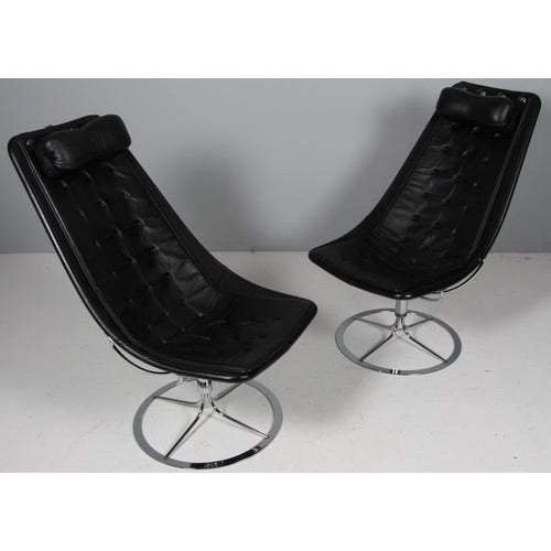 Bruno Mathsson Jetson lounge chairs with black leather. Frame in steel. Made by Bruno Mathsson International. This piece...