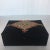 Hand embroidered semi precious stones on a hand embroidered center thread medallion makes up this black felt catchall box....