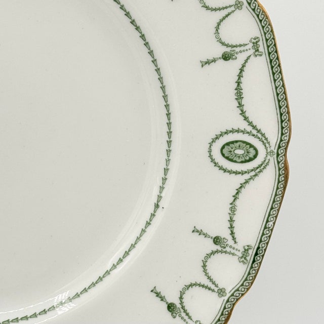 A particularly graceful example of early Royal Doulton tableware, this set of four antique Countess plates dates to the...