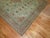 An early 20th century Persian Tabriz rug in earth tones with an autumn-like motif.