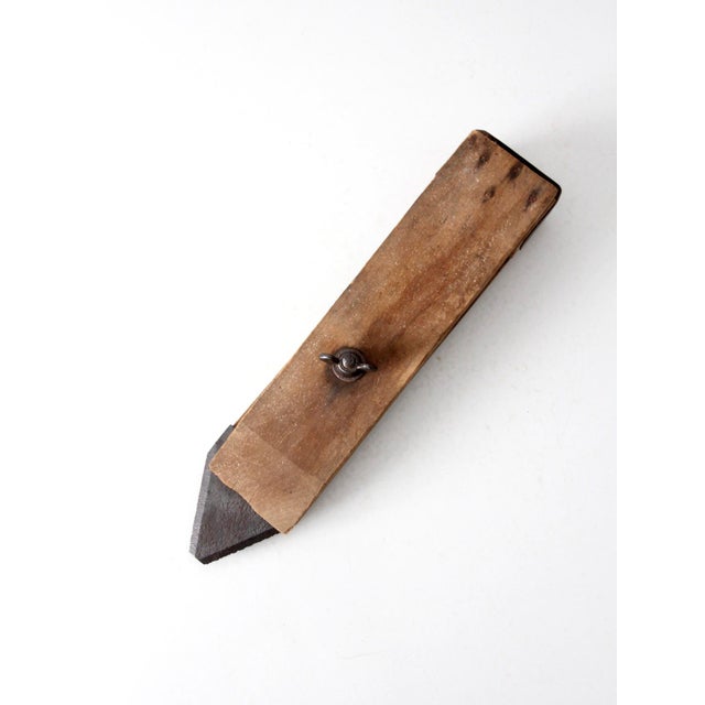 Antique primitive hand scraper with a beautifully utilitarian form, crafted with a wooden body, adjustable steel blade,...