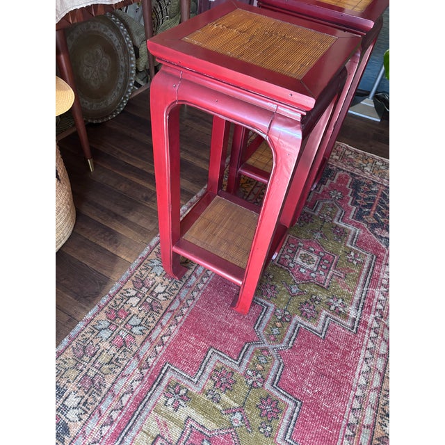 Set of (2) Red Lacquered Wood Pedestals/Plant Stands Insert caning 34” tall 14”x14” square In good vintage condition with...
