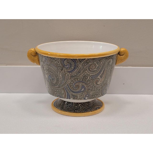 Spectacular ceramic table center designed in the 80s or 90s of the previous century by Etro. Its entire surface is...