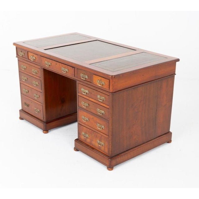 Superb Victorian mahogany two pedestal desk with impressive proportions and excellent craftsmanship Features an unusual...