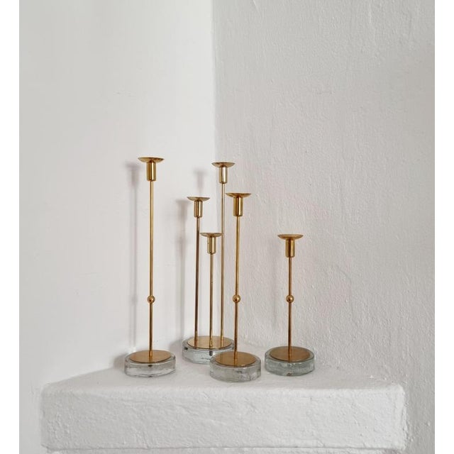 A rare set of four candle holders, one for three candles (total for six candles). Delicate shape, still stabile, a...