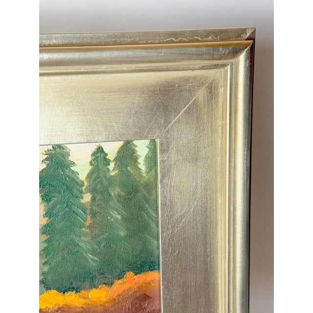 Vibrant, warm acrylic landscape painting on canvas, depicting a flowing river at the base of majestic mountains and pines....