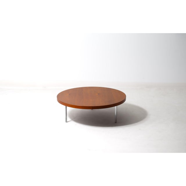 A quietly architectural design by Kho Liang Ie for Artifort. Generous round top in teak veneer with a solid edge, set on...