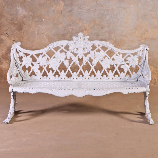 This elegant garden bench captures the romanticism of high-Victorian cast-iron design, smartly re-engineered in...