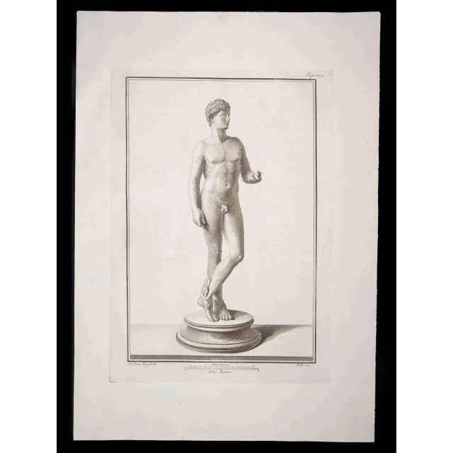 Hermes in Ancient Roman Statue, from the series "Antiquities of Herculaneum", is an original etching on paper realized by...
