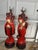 A striking pair of mid-20th-century Chinoiserie figural table lamps, dating to the late 1940s or 1950s. These lamps are...