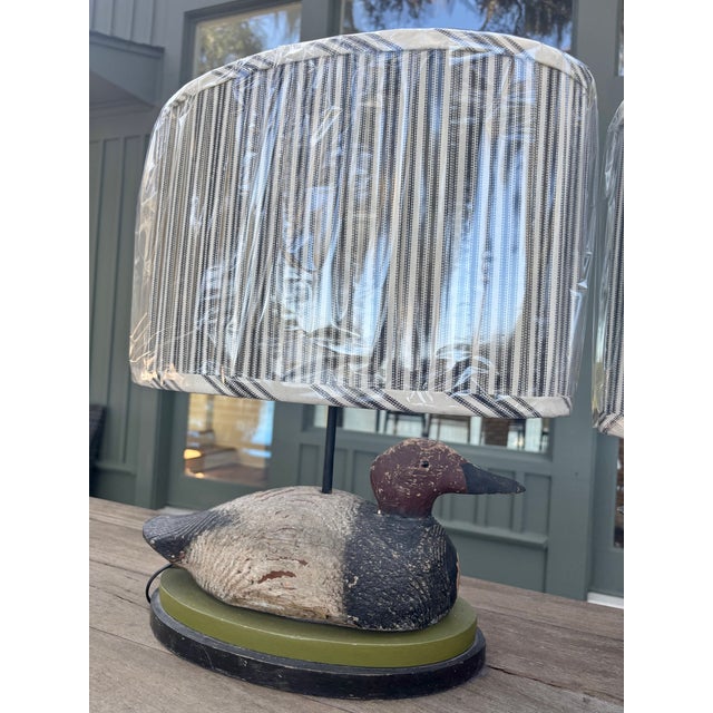 Rustic Early 20th Century Hand-Carved Duck Decoy Lamps With Custom Ticking Stripe Shades – Pair For Sale - Image 3 of 17