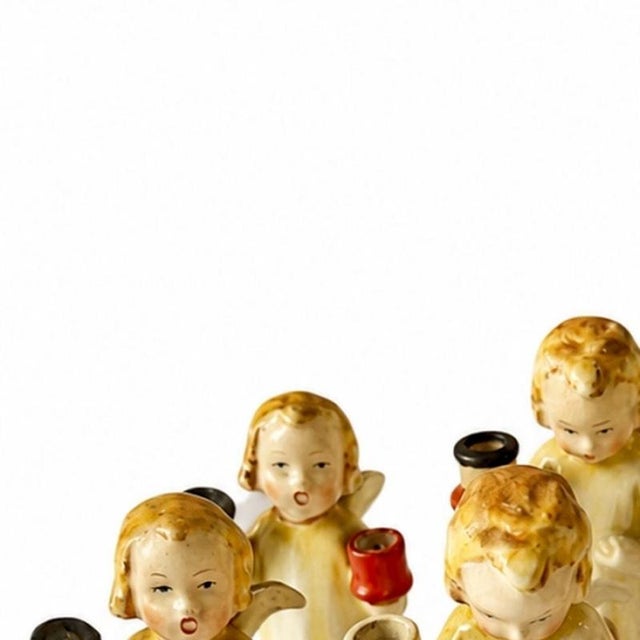 Porcelain - 7 Angels - Maria Spotl. 20th-century Portuguese porcelain sculptures; inspired by the colorful designs of...