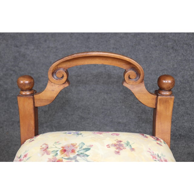 Introduce timeless European elegance into your home with this exquisite Italian Biedermeier style hand-carved walnut bench...