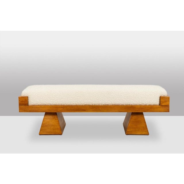 Bench in blond ash with a seat upholstered in cream-colored looped fabric. Italian artisanal work in small series....