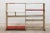 Pilastro wire bookshelf with original enameled metal plates in white and red. In original condition with visible signs of...