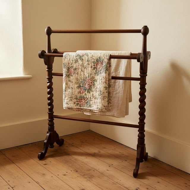 Antique Victorian freestanding towel or quilt rack, c. 1860–1890, attributed to England. Crafted in richly toned wood,...