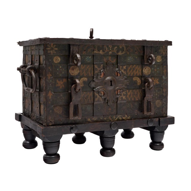 A powerful and architecturally striking 17th century Spanish Baroque iron-mounted dowry chest, or arca de novia, retaining...