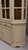 Large pine chalk-painted china cabinet with two drawers and glass doors. Comes apart into two pieces. Sound construction...