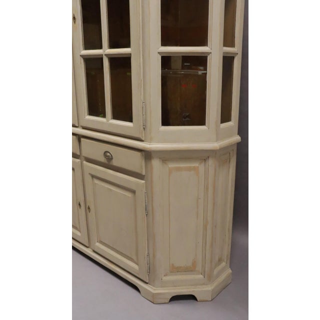 Large pine chalk-painted china cabinet with two drawers and glass doors. Comes apart into two pieces. Sound construction...