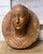 This terracotta medallion portrait depicts a Renaissance-style lady, very similar to a work produced by Frédérich...